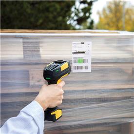 Handheld scanner used to scan barcode in outdoor location.